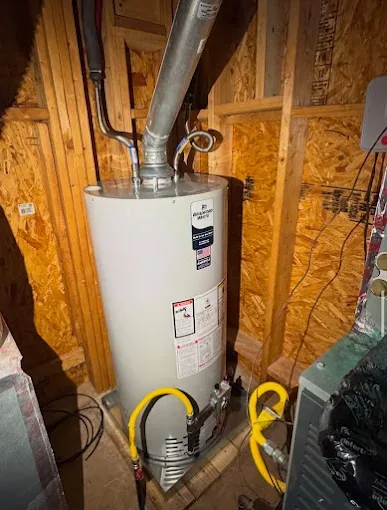 Newly installed gas storage water heater with flue and flexible connectors